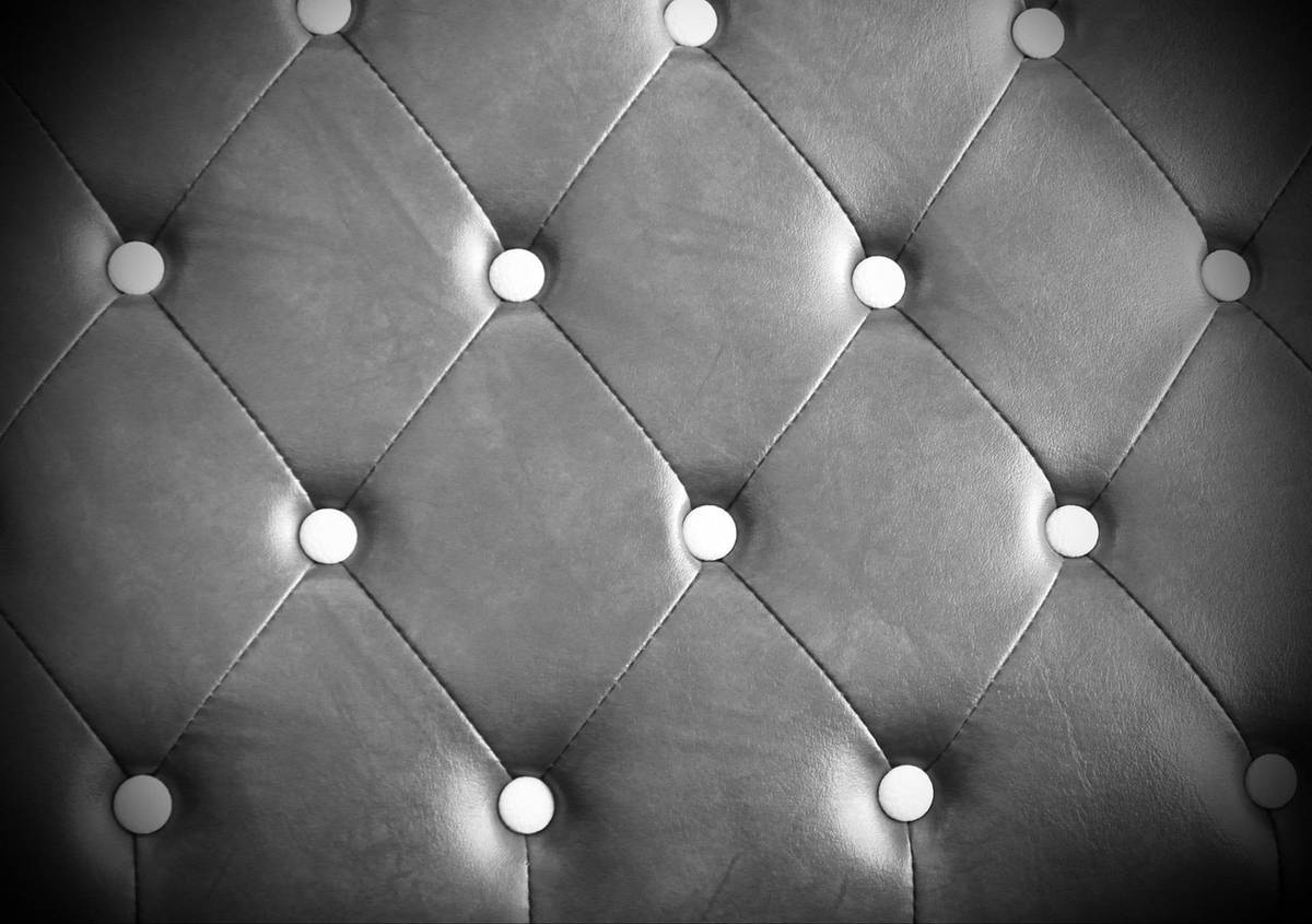Tapissu tufté en cuir avec boutons, surface rembourrée en forme de losanges
